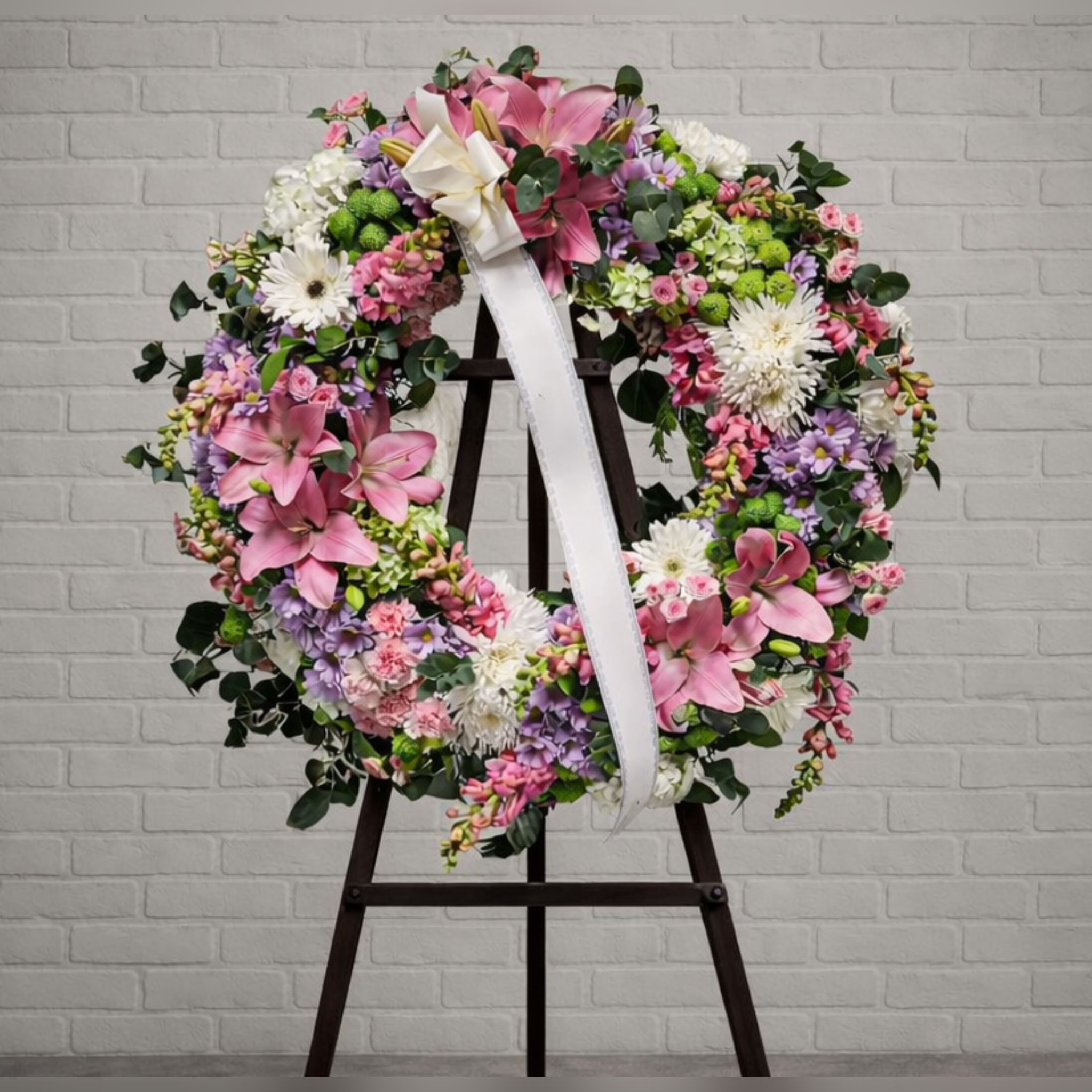 Corona fúnebre en rosas y blancos Zaragoza